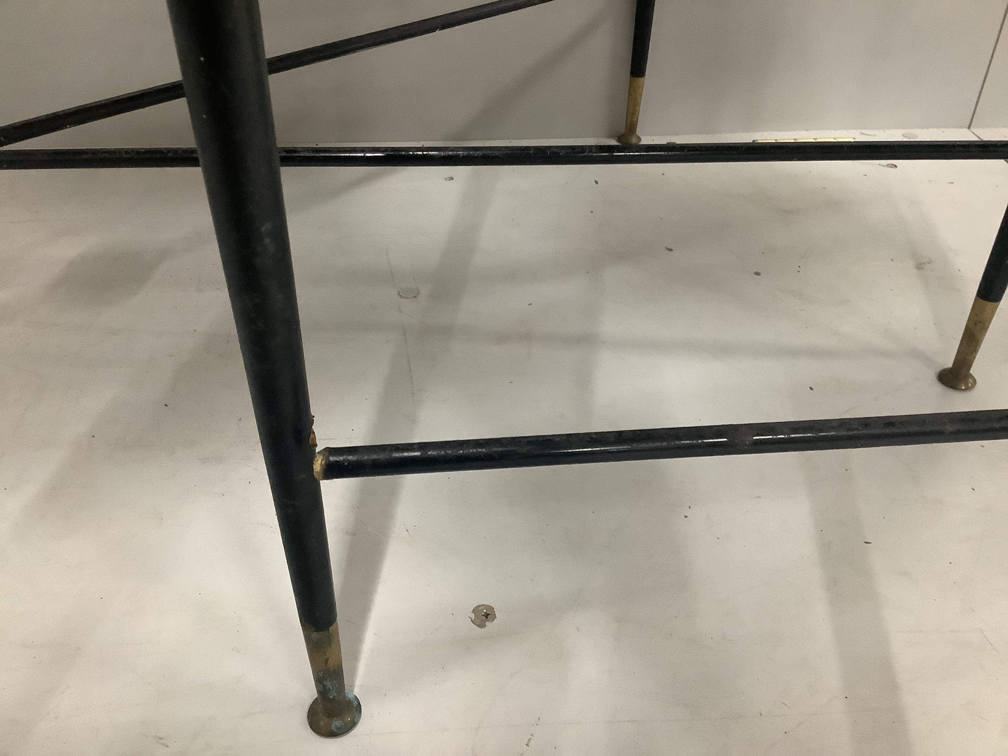 A pair of mid century Italian style brass mounted ebonised two drawer side tables, width 124cm, depth 48cm, height 70cm